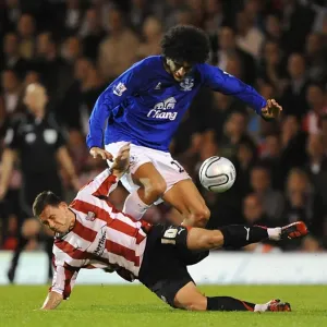 Fierce Rivalry: Marouane Fellaini vs. Charlie MacDonald - Everton vs. Brentford, Carling Cup Third Round, Griffin Park (September 21, 2010) Fierce Rivalry: Marouane Fellaini vs. Charlie MacDonald - Everton vs. Brentford, Carling Cup Third Round, Griffin Park (September 21, 2010)