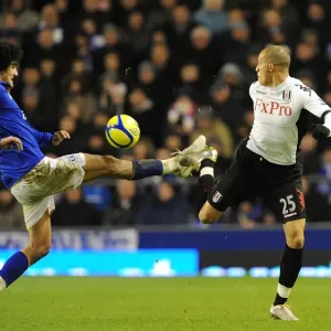 Fierce Rivalry: Marouane Fellaini vs. Bobby Zamora - Everton vs. Fulham's Intense FA Cup Battle for the Ball Fierce Rivalry: Marouane Fellaini vs. Bobby Zamora - Everton vs. Fulham's Intense FA Cup Battle for the Ball
