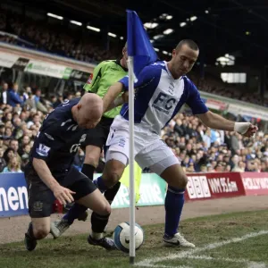 A Fierce Rivalry Unfolds: Andrew Johnson vs. David Murphy in the Birmingham vs. Everton Premier League Clash, 2008 A Fierce Rivalry Unfolds: Andrew Johnson vs. David Murphy in the Birmingham vs. Everton Premier League Clash, 2008