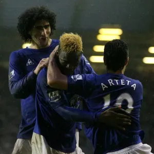Five-Star Everton: Saha, Fellaini, and Arteta's Jubilant Celebration of Their Fifth Goal vs. Blackpool (Everton vs. Blackpool, Barclays Premier League, Goodison Park, 05 February 2011) Five-Star Everton: Saha, Fellaini, and Arteta's Jubilant Celebration of Their Fifth Goal vs. Blackpool (Everton vs. Blackpool, Barclays Premier League, Goodison Park, 05 February 2011)