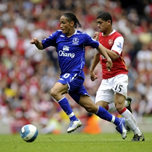 Football - Arsenal v Everton Barclays Premier League - Emirates Stadium - 4 / 5 / 08 Arsenals Denilson and Evertons Steven Pienaar (L) in action Mandatory Credit: Action Images / Tony O Brien Livepic NO ONLINE / INTERNET USE WITHOUT A LICENCE