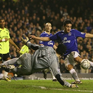 Football - Everton v Chelsea - Carling Cup Semi Final Second Leg - Goodison Park - 07 / 08 - 23 / 1 / 08 Chelseas Petr Cech (C) in action with Evertons Tim Cahill (R) Mandatory Credit: Action Images /