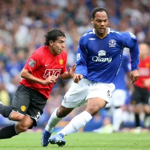 Football - Everton v Manchester United Barclays Premier League - Goodison Park - 15 / 9 / 07 Evertons Joleon Lescott (R) and Manchester Uniteds Carlos Tevez in action Mandatory Credit: Action Images / Matthew Football - Everton v Manchester United Barclays Premier League - Goodison Park - 15 / 9 / 07 Evertons Joleon Lescott (R) and Manchester Uniteds Carlos Tevez in action Mandatory Credit: Action Images / Matthew