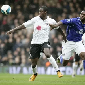 Football - Fulham v Everton Barclays Premier League - Craven Cottage - 16 / 3 / 08 Fulhams Eddie Johnson and Evertons Joseph Yobo Mandatory Credit: Action Images / John Sibley Livepic NO ONLINE / INTERNET USE WITHOUT A LICENCE FROM THE FOOTBALL D