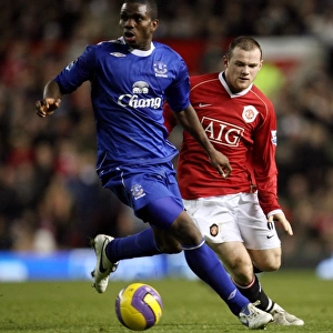 Football - Manchester United v Everton - FA Barclays Premiership - Old Trafford - 06 / 07 - 29 / 11 / 06 Joseph Yobo - Everton in action against Wayne Rooney - Manchester United Mandatory Credit: Action Images / Carl Recine