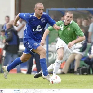 Football - Northern Ireland XI v Everton - Pre Season Friendly - Coleraine Showgrounds - 14 / 7 / 07 Evertons Andy Van der Meyde in action against Northern Ireland XIs Aaron Callaghan Mandatory Credit: Action Images /