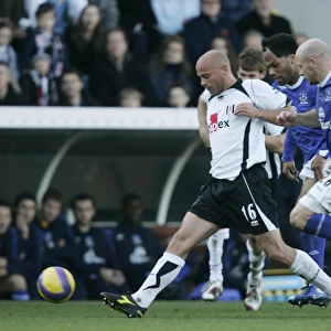 Fulham v Everton 4 / 11 / 06 Claus Jensen - Fulham in action against Joleon Lescott