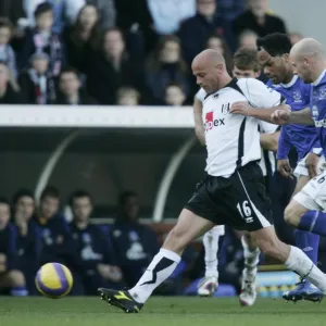 Fulham v Everton 4 / 11 / 06 Claus Jensen - Fulham in action against Joleon Lescott