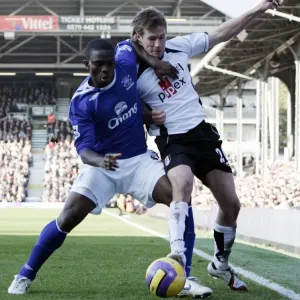 Fulham v Everton - 4 / 11 / 06 Fulhams Brian McBride in action against Evertons Joseph Yobo Fulham v Everton - 4 / 11 / 06 Fulhams Brian McBride in action against Evertons Joseph Yobo