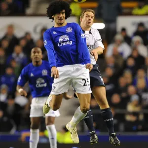 Head-to-Head at Goodison Park: A Battle of Aerial Supremacy between Fellaini and Davies (Everton vs. Bolton Wanderers, Barclays Premier League, 10 November 2010) Head-to-Head at Goodison Park: A Battle of Aerial Supremacy between Fellaini and Davies (Everton vs. Bolton Wanderers, Barclays Premier League, 10 November 2010)