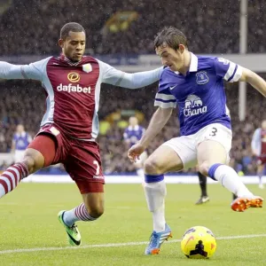 Intense Battle for Ball Possession: Baines vs. Bacuna - Everton vs. Aston Villa, Premier League (2014) Intense Battle for Ball Possession: Baines vs. Bacuna - Everton vs. Aston Villa, Premier League (2014)