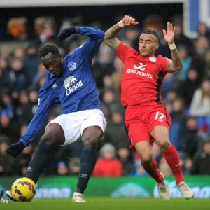 Intense Battle for Ball Possession: Lukaku vs. Simpson at Goodison Park Intense Battle for Ball Possession: Lukaku vs. Simpson at Goodison Park