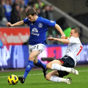Intense Battle for Ball Possession: Seamus Coleman vs. Matthew Taylor, Everton vs. Bolton Wanderers, Barclays Premier League (February 13, 2011) Intense Battle for Ball Possession: Seamus Coleman vs. Matthew Taylor, Everton vs. Bolton Wanderers, Barclays Premier League (February 13, 2011)