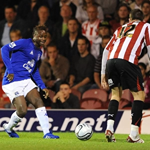 Intense Battle: Magaye Gueye vs. Michael Spillane - Everton vs. Brentford, Carling Cup Third Round, 2010