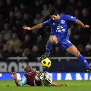 Intense Battle: Mikel Arteta vs. Luis Boa Morte - Unforgettable Tackle in the Barclays Premier League Clash between West Ham United and Everton (December 2010, Upton Park) Intense Battle: Mikel Arteta vs. Luis Boa Morte - Unforgettable Tackle in the Barclays Premier League Clash between West Ham United and Everton (December 2010, Upton Park)
