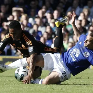 Intense Battle: Osman vs. Malouda at Goodison Park - Everton vs. Chelsea, Premier League (May 2011) Intense Battle: Osman vs. Malouda at Goodison Park - Everton vs. Chelsea, Premier League (May 2011)