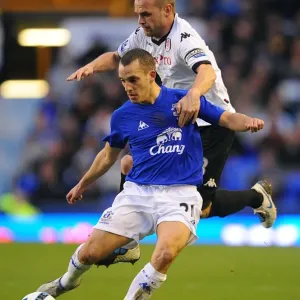 Intense Battle: Osman vs Murphy at Goodison Park - Everton vs Fulham, Barclays Premier League (19 March 2011) Intense Battle: Osman vs Murphy at Goodison Park - Everton vs Fulham, Barclays Premier League (19 March 2011)