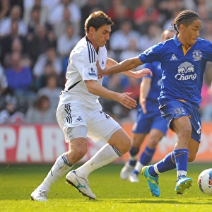 Intense Battle: Pienaar vs. Rangel at Swansea City vs. Everton, Barclays Premier League (24 March 2012, Liberty Stadium)