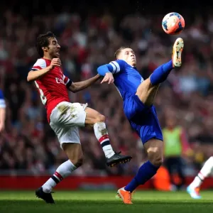Intense Battle for Possession: Flamini vs. Barkley in FA Cup Sixth Round Clash between Arsenal and Everton Intense Battle for Possession: Flamini vs. Barkley in FA Cup Sixth Round Clash between Arsenal and Everton