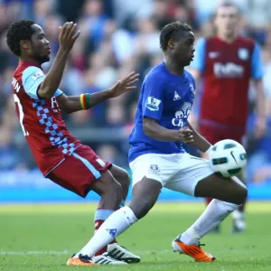 Intense Battle for Possession: Magaye Gueye vs Jean Makoun (Everton vs Aston Villa, Barclays Premier League, Goodison Park, 04 April 2011) Intense Battle for Possession: Magaye Gueye vs Jean Makoun (Everton vs Aston Villa, Barclays Premier League, Goodison Park, 04 April 2011)