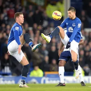 Everton FC Print - Ross Barkley and Kevin Mirallas in Intense Battle Everton FC Print - Ross Barkley and Kevin Mirallas in Intense Battle