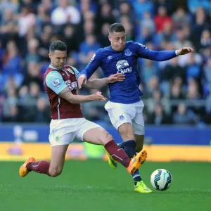 Intense Battle: Ross Barkley vs. Jason Shackell at Goodison Park - Everton vs. Burnley, Premier League Intense Battle: Ross Barkley vs. Jason Shackell at Goodison Park - Everton vs. Burnley, Premier League