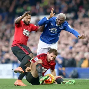 Intense Rivalry: Arouna Kone vs. Craig Dawson's Battle for the Ball at Goodison Park Intense Rivalry: Arouna Kone vs. Craig Dawson's Battle for the Ball at Goodison Park