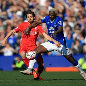 Intense Rivalry: Arouna Kone vs Joe Allen - Battle for Ball Possession at Goodison Park Intense Rivalry: Arouna Kone vs Joe Allen - Battle for Ball Possession at Goodison Park