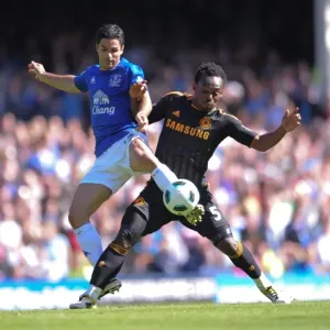 Intense Rivalry: Arteta vs. Essien at Goodison Park - Everton vs. Chelsea, Premier League Showdown (May 2011) Intense Rivalry: Arteta vs. Essien at Goodison Park - Everton vs. Chelsea, Premier League Showdown (May 2011)