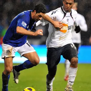 Intense Rivalry: Arteta vs. Sturridge Battle for Ball - Everton vs. Bolton Wanderers, Premier League (2011) Intense Rivalry: Arteta vs. Sturridge Battle for Ball - Everton vs. Bolton Wanderers, Premier League (2011)
