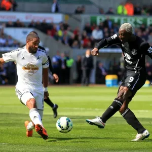Intense Rivalry: Ashley Williams vs. Arouna Kone Battle at Swansea City's Liberty Stadium - Everton vs. Swansea City, Barclays Premier League Intense Rivalry: Ashley Williams vs. Arouna Kone Battle at Swansea City's Liberty Stadium - Everton vs. Swansea City, Barclays Premier League