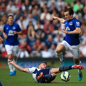 Intense Rivalry: Baines vs Morrison - A Battle for Ball Possession, Everton vs West Bromwich Albion, Premier League