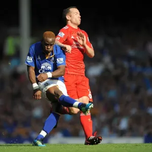 Intense Rivalry: Charlie Adam's Last-Ditch Defensive Stand Against Louis Saha's Goal Attempt (Everton vs Liverpool, Barclays Premier League, October 1, 2011) Intense Rivalry: Charlie Adam's Last-Ditch Defensive Stand Against Louis Saha's Goal Attempt (Everton vs Liverpool, Barclays Premier League, October 1, 2011)