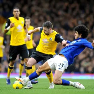 Intense Rivalry: David Dunn vs. Marouane Fellaini - Battle for Supremacy at Goodison Park (Premier League) Intense Rivalry: David Dunn vs. Marouane Fellaini - Battle for Supremacy at Goodison Park (Premier League)