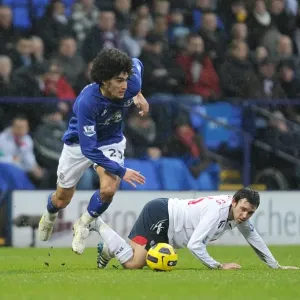 Intense Rivalry: Fellaini vs. Davies Battle at Reebok Stadium - Everton vs. Bolton Wanderers (BPL, 13 February 2011) Intense Rivalry: Fellaini vs. Davies Battle at Reebok Stadium - Everton vs. Bolton Wanderers (BPL, 13 February 2011)