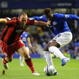 Magaye Gueye vs. Lee Croft Print: Intense Rivalry on the Football Field Magaye Gueye vs. Lee Croft Print: Intense Rivalry on the Football Field