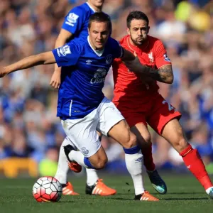 Intense Rivalry: Jagielka vs. Ings Battle for Ball at Goodison Park Intense Rivalry: Jagielka vs. Ings Battle for Ball at Goodison Park