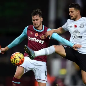 Intense Rivalry: Jenkinson vs. Mirallas at Upton Park - West Ham United vs. Everton Premier League Clash Intense Rivalry: Jenkinson vs. Mirallas at Upton Park - West Ham United vs. Everton Premier League Clash