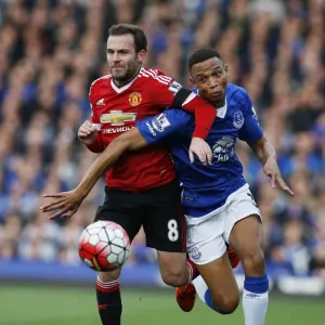 Intense Rivalry: Juan Mata vs Brendan Galloway - Everton vs Manchester United Battle for the Ball Intense Rivalry: Juan Mata vs Brendan Galloway - Everton vs Manchester United Battle for the Ball