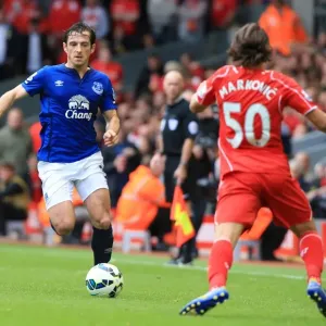 Intense Rivalry: Leighton Baines vs. Lazar Markovic - Liverpool vs. Everton Clash at Anfield Intense Rivalry: Leighton Baines vs. Lazar Markovic - Liverpool vs. Everton Clash at Anfield