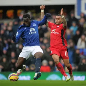 Intense Rivalry: Lukaku vs. Simpson's Battle for Ball Possession at Goodison Park Intense Rivalry: Lukaku vs. Simpson's Battle for Ball Possession at Goodison Park