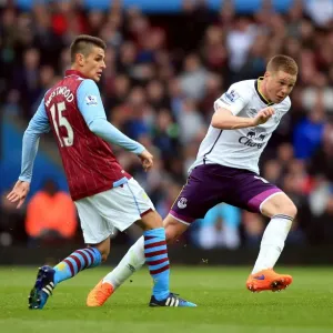 Intense Rivalry: McCarthy vs. Westwood's Battle for Ball Possession - Aston Villa vs. Everton, Premier League Intense Rivalry: McCarthy vs. Westwood's Battle for Ball Possession - Aston Villa vs. Everton, Premier League
