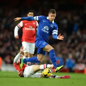 Intense Rivalry: Ramsey vs. Barkley Tackle in Arsenal vs. Everton Premier League Showdown (Arsenal 1-1 Everton, Emirates Stadium, 08-12-2013) Intense Rivalry: Ramsey vs. Barkley Tackle in Arsenal vs. Everton Premier League Showdown (Arsenal 1-1 Everton, Emirates Stadium, 08-12-2013)