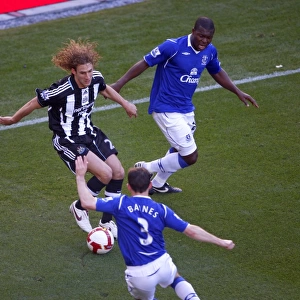 Intense Rivalry: Yakubu vs Coloccini Battle at Goodison Park, Everton vs Newcastle United, Barclays Premier League, 2008