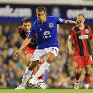 Jack Rodwell vs. Damien Johnson: Everton vs. Huddersfield Town's Intense Carling Cup Showdown at Goodison Park (25 August 2010) Jack Rodwell vs. Damien Johnson: Everton vs. Huddersfield Town's Intense Carling Cup Showdown at Goodison Park (25 August 2010)