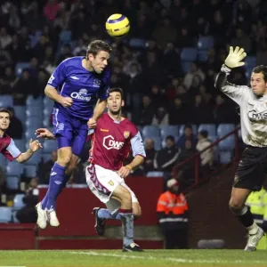 James Beattie's Heart-Stopping Near-Miss: A Thwarted Goal Attempt for Everton FC (First Half) James Beattie's Heart-Stopping Near-Miss: A Thwarted Goal Attempt for Everton FC (First Half)