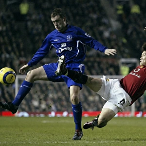 James McFadden's Unyielding Control: Holding His Ground Against Ji Sung Park's Challenges
