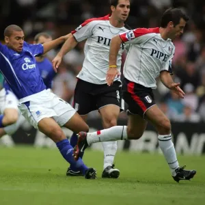 James Vaughan Tackled by Fulham Defenders Print James Vaughan Tackled by Fulham Defenders Print