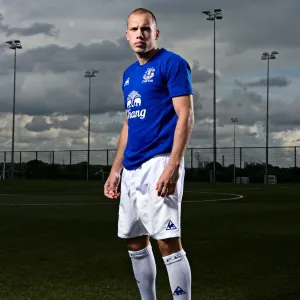 John Heitinga Unveils Everton's 2010/11 Home Kit: A First Look John Heitinga Unveils Everton's 2010/11 Home Kit: A First Look