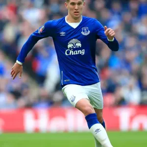 John Stones Unwavering Determination: Everton vs Manchester United in the Emirates FA Cup Semi-Final at Wembley John Stones Unwavering Determination: Everton vs Manchester United in the Emirates FA Cup Semi-Final at Wembley